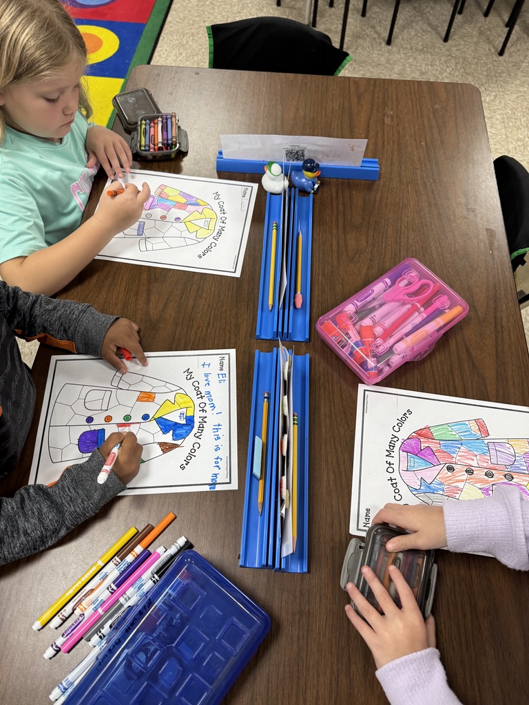 students coloring pictures