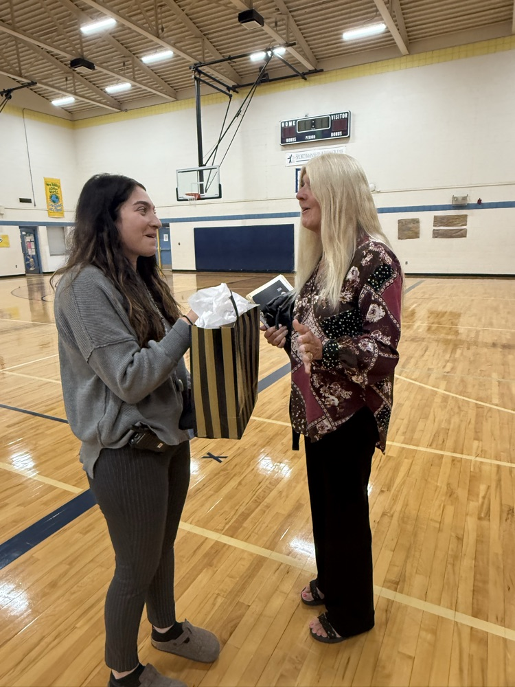 Teacher receiving her award