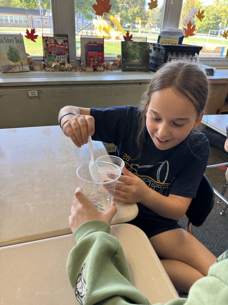 student having reaction to science experiment 