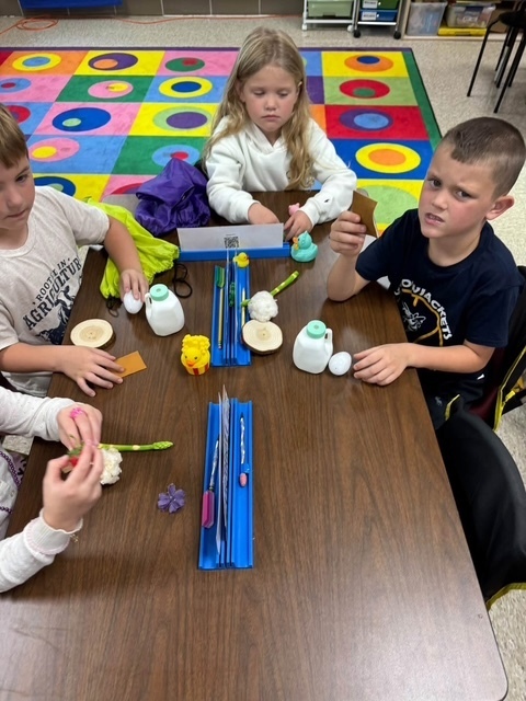 Students working at a table.