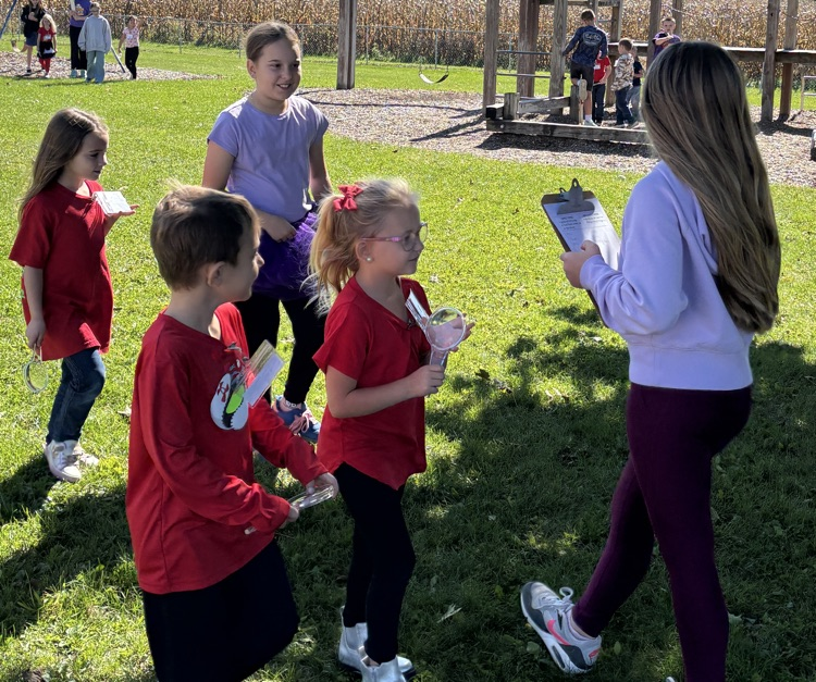 students looking for living things