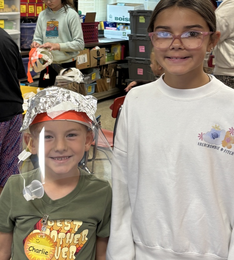students with fire helmet model