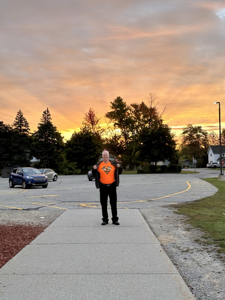 Mr. Pendell with his Superman t-shirt and an amazing sunrise!!