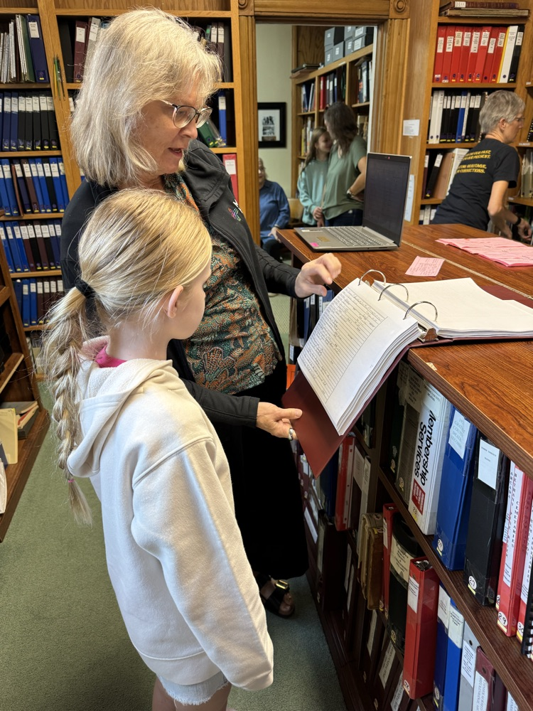 student looking at document 