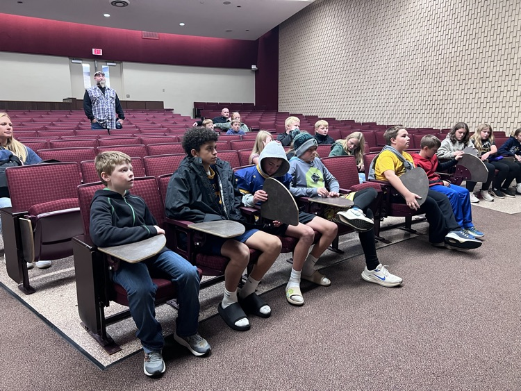 students in a large college classroom at CMU