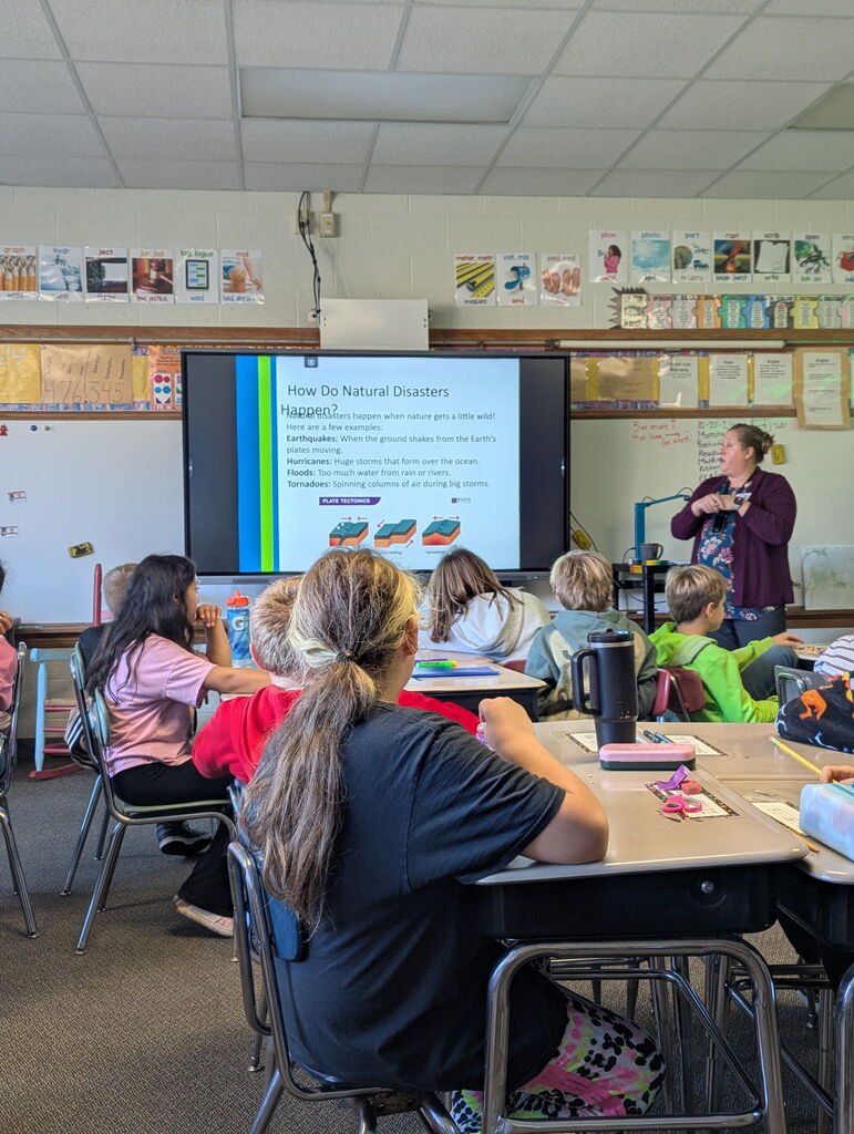 4th graders listening to a presentation about emergency preparedness