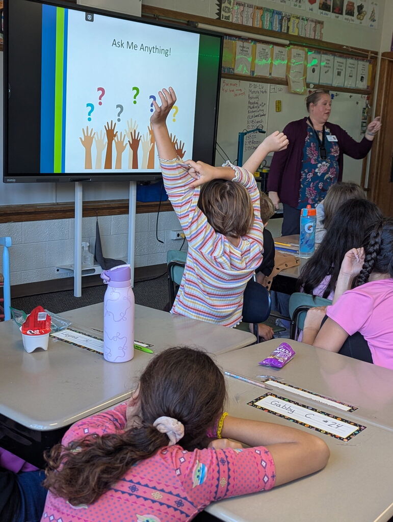 4th graders listening to a presentation about emergency preparedness.