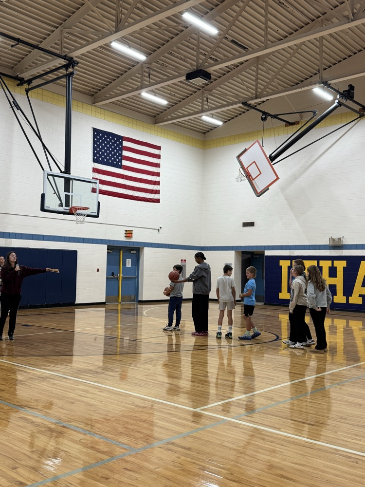 students playing basketball 