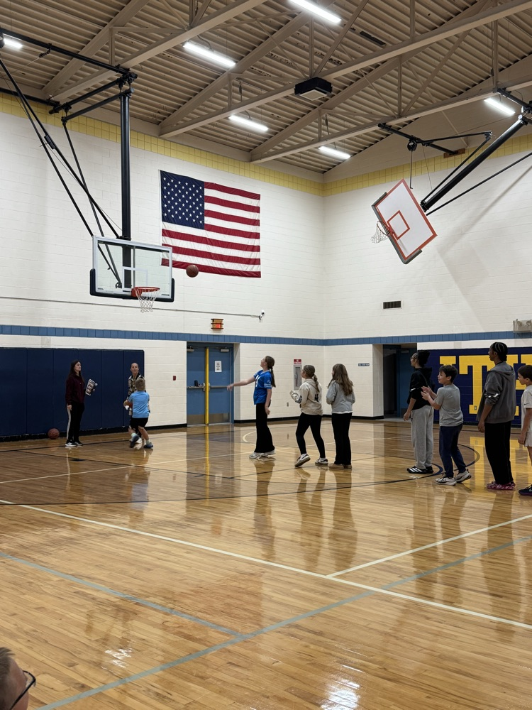 students playing basketball 