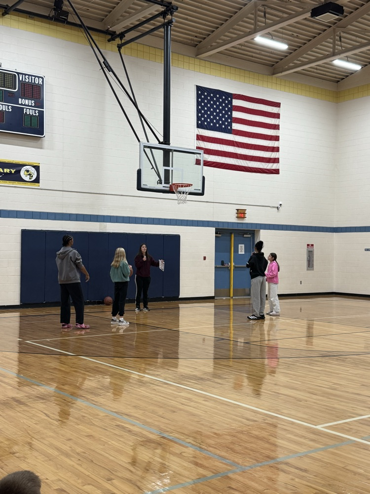 students playing basketball 