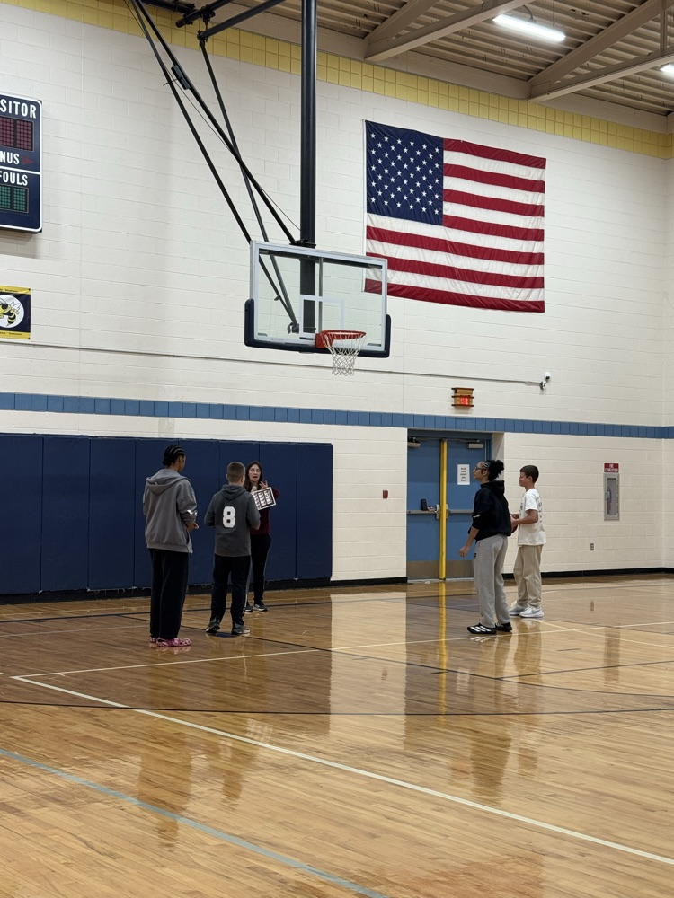 students playing basketball 