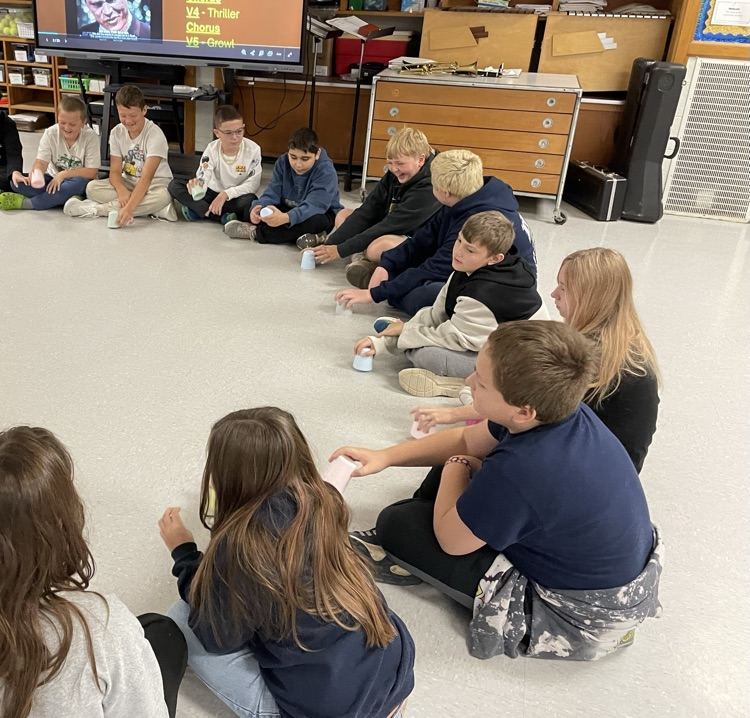 students sitting in a circle 