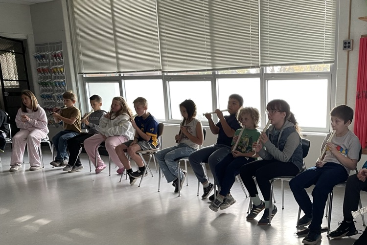 students playing recorder