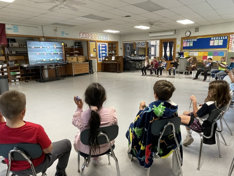 students playing percussion instruments