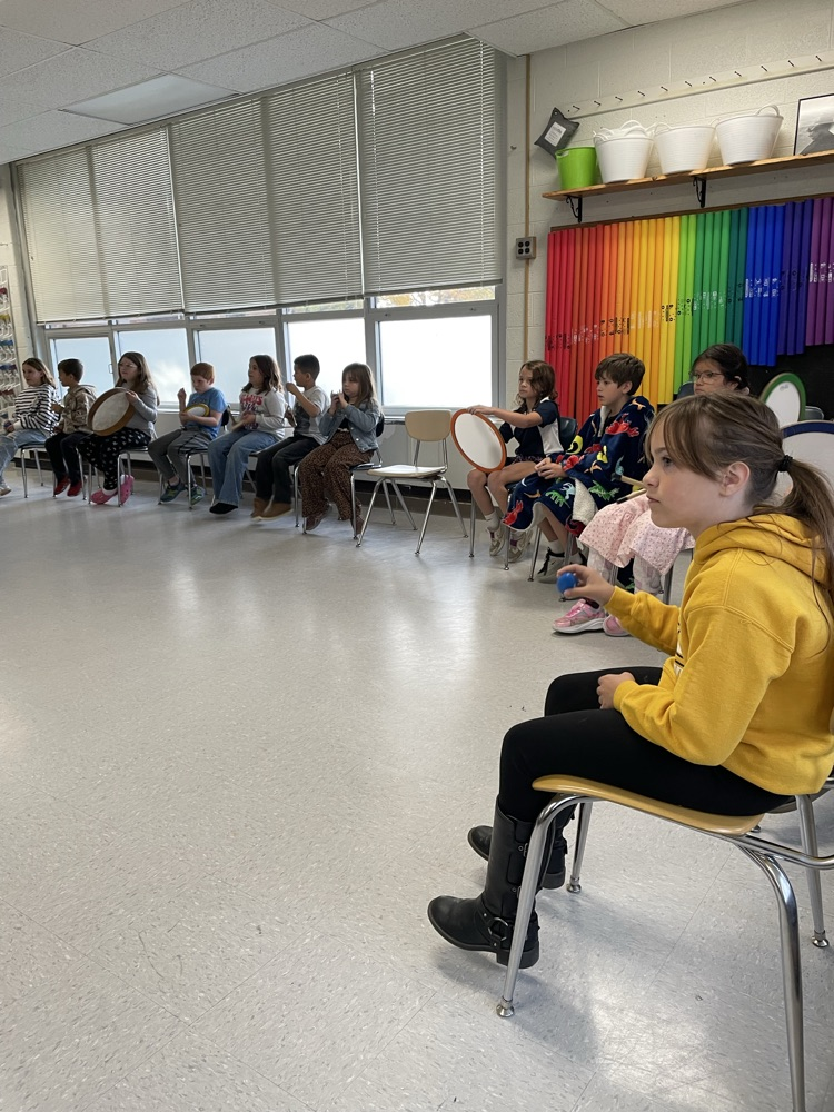 students playing percussion instruments