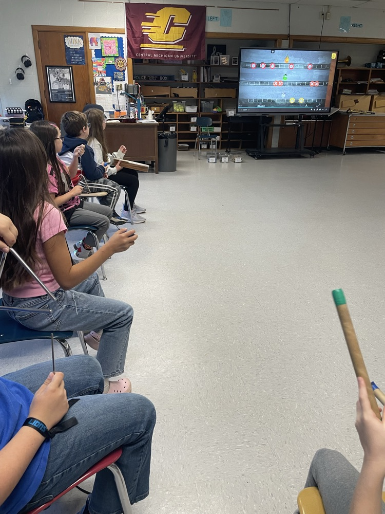 students playing percussion instruments
