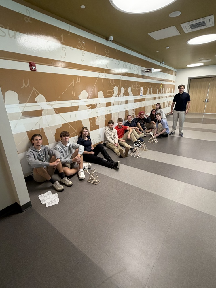 Engineering Students and their catapult designs 