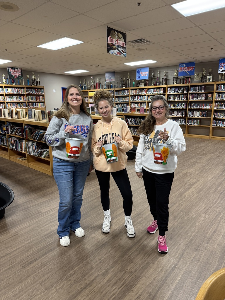 Families painting in a family paint night hosted by Partners for Rural Impact.