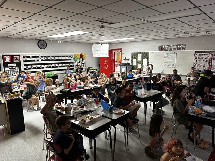 too hot outside so we piled in one classroom to watch a movie!