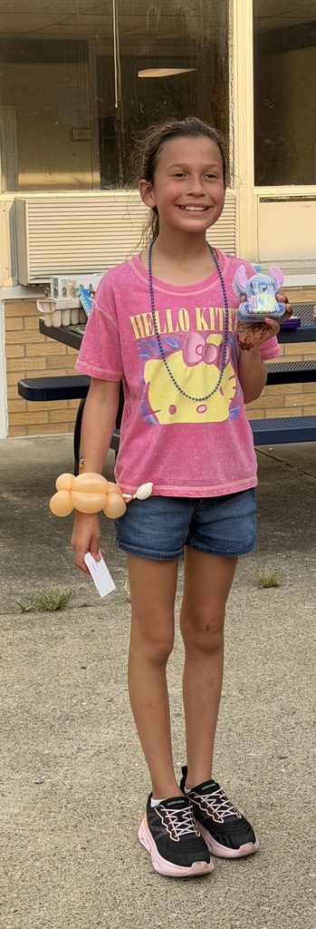 A new student with a animal balloon.