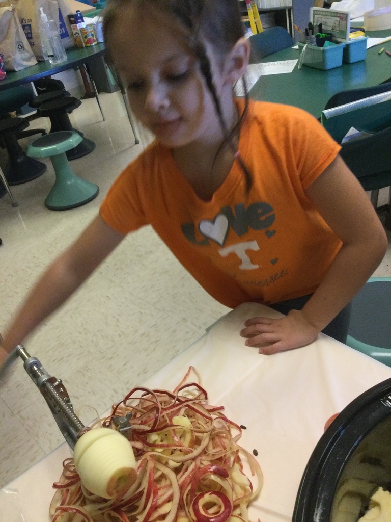 Student peeling apples