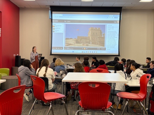 Mrs. K teaching about the Great Wall of China