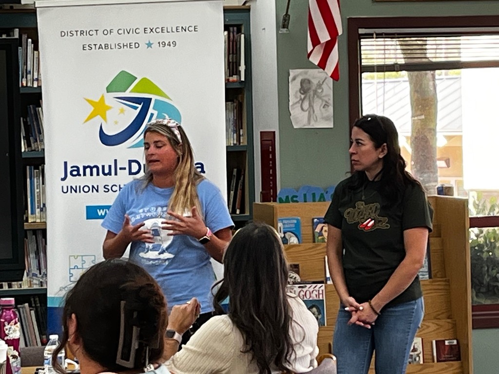 Picture of Ms Stewart and Ms Mendoza presenting