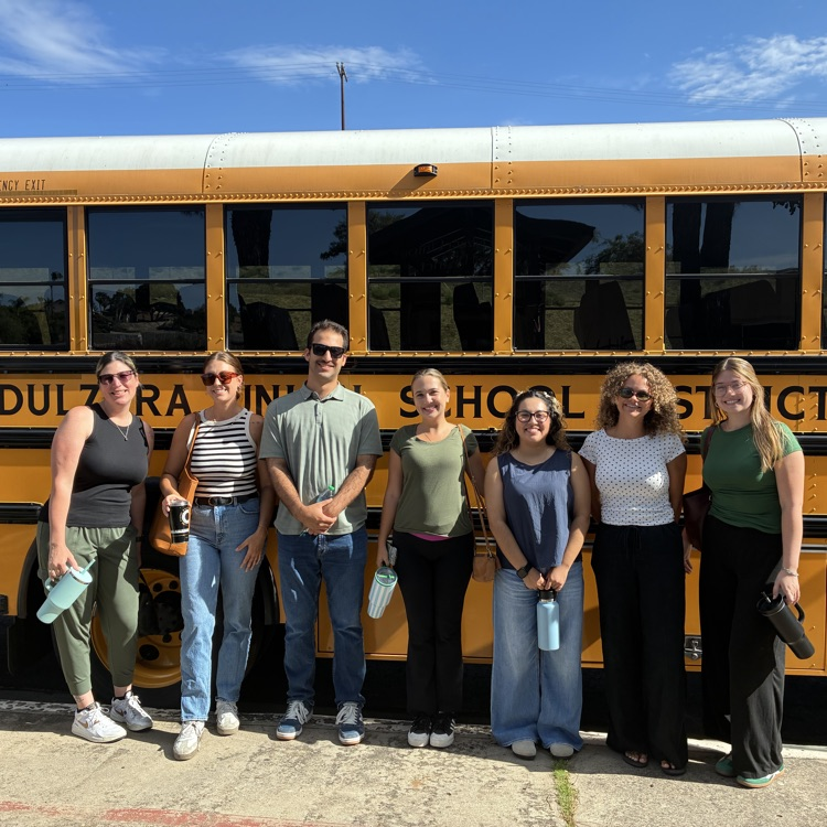 teachers and a school bus