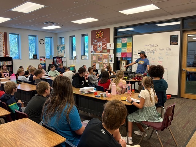 Michael Meyer shares info about rock climbing to 6th grade
