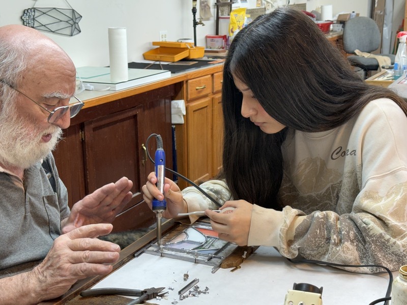 A. Arceo Cavazos learning how to lead glass
