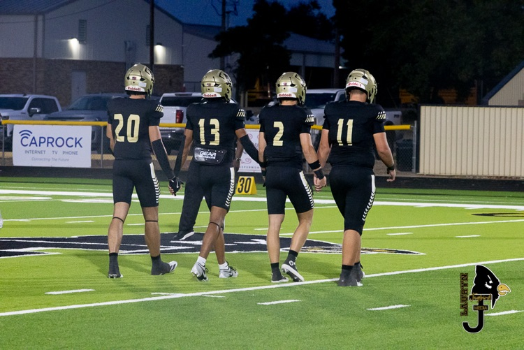The Jaybirds headed to center field for the coin toss