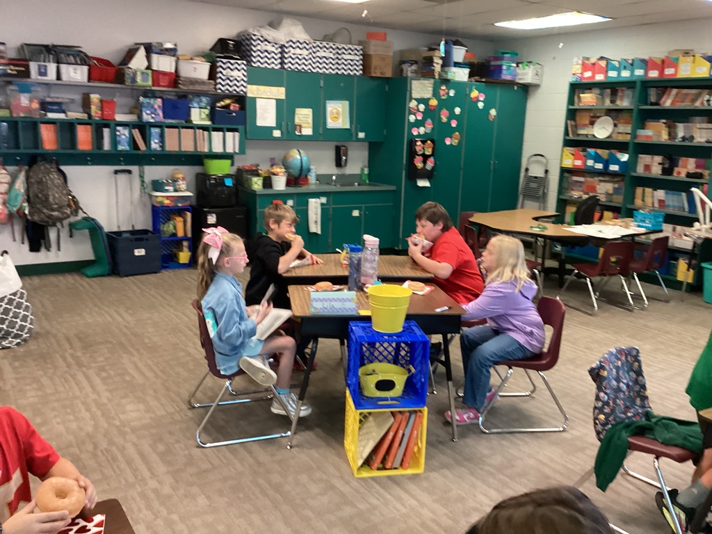 Kids eating donuts