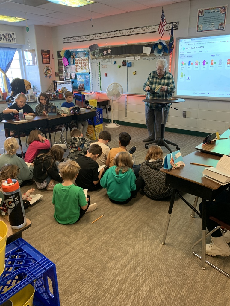 Third graders receiving their dictionaries