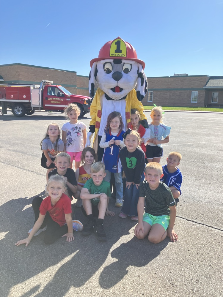 Ms Moore’s class with Sparky, the fire dog.