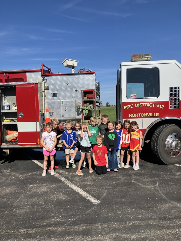 Ms. Moore’s 1st grade class after touring the Nortonville fire truck