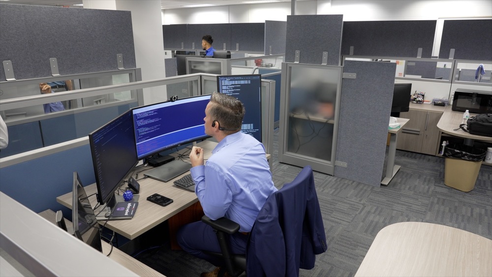 JCPS IT employee on computer