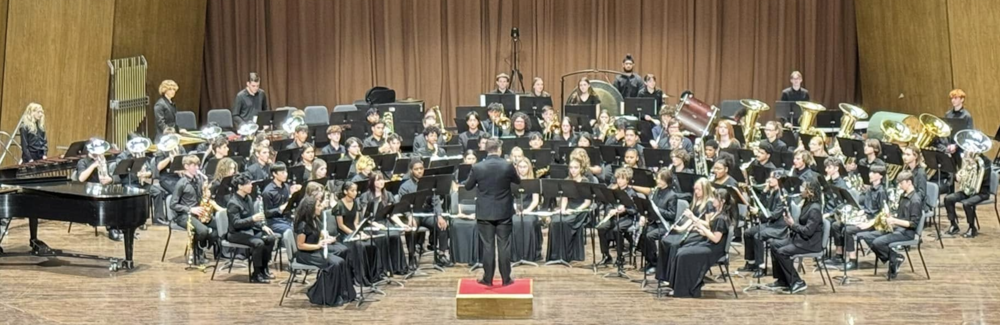 A band performs on stage.