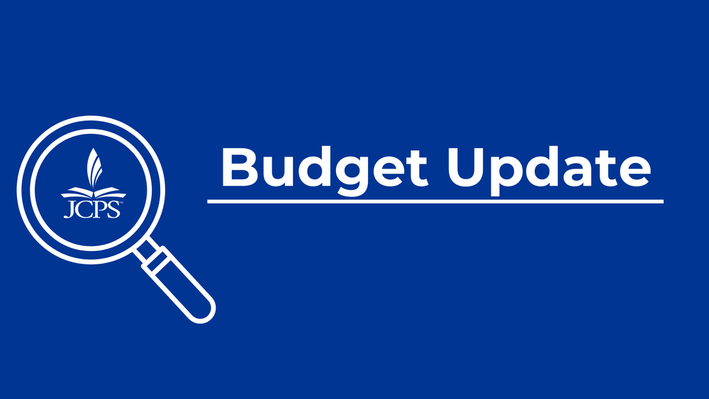 A magnifying glass next to the words "JCPS Budget Update"