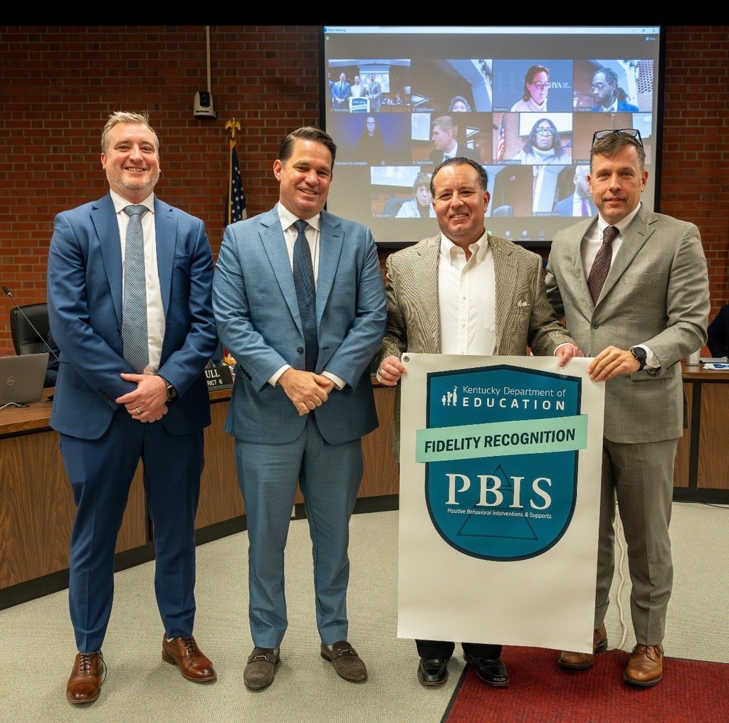 Mr. Perkins accepting the PBIS Award at the Board Meeting