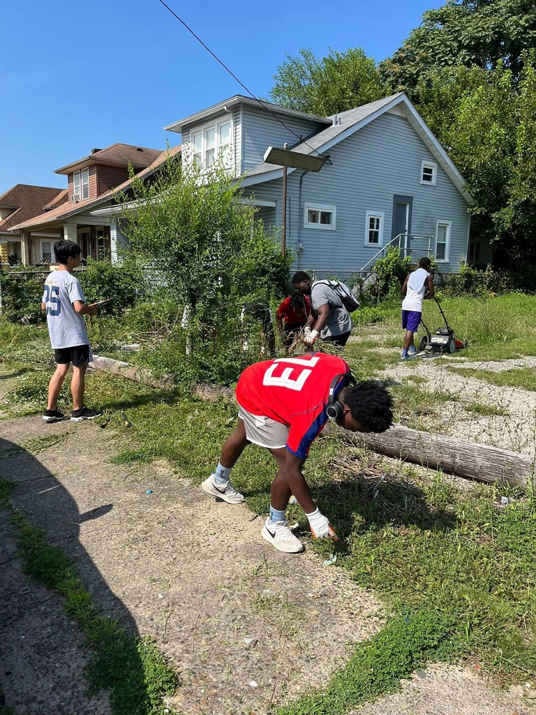 Students do yard work.