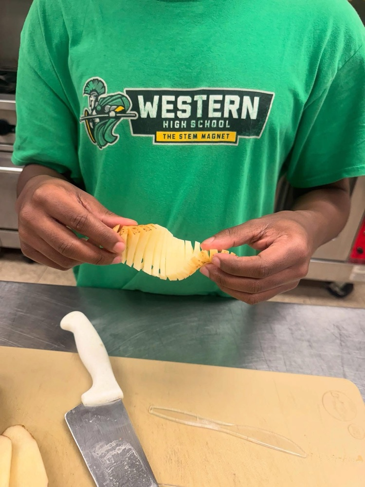 culinary student students practicing knife skills