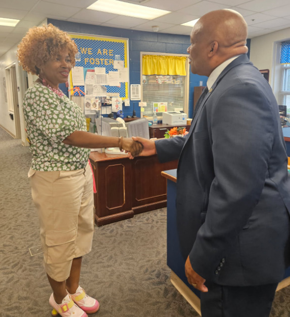 Dr. Yearwood with Foster staff 