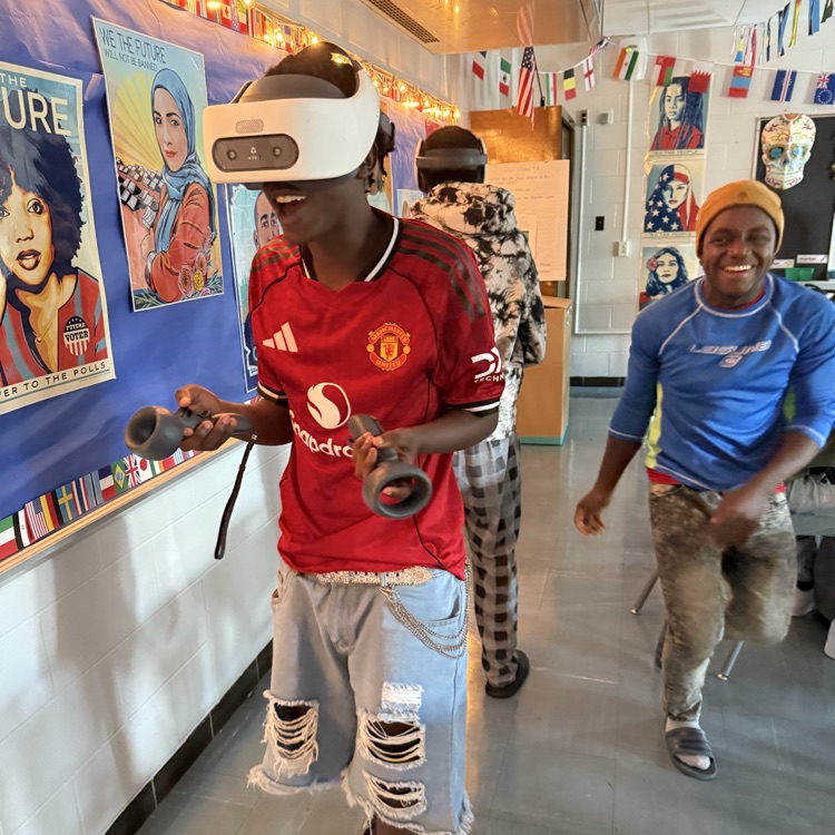 Students playing with virtual reality set