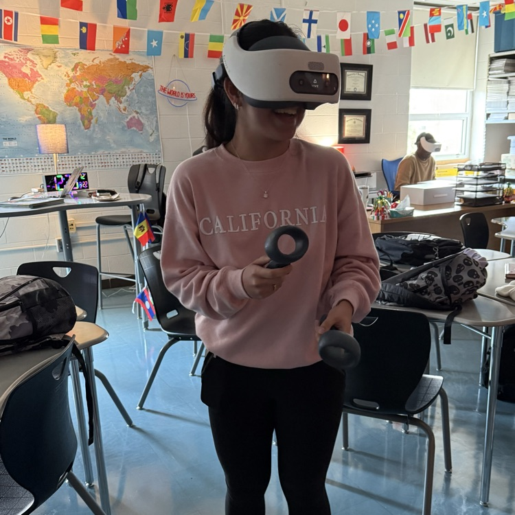 Students playing with virtual reality set