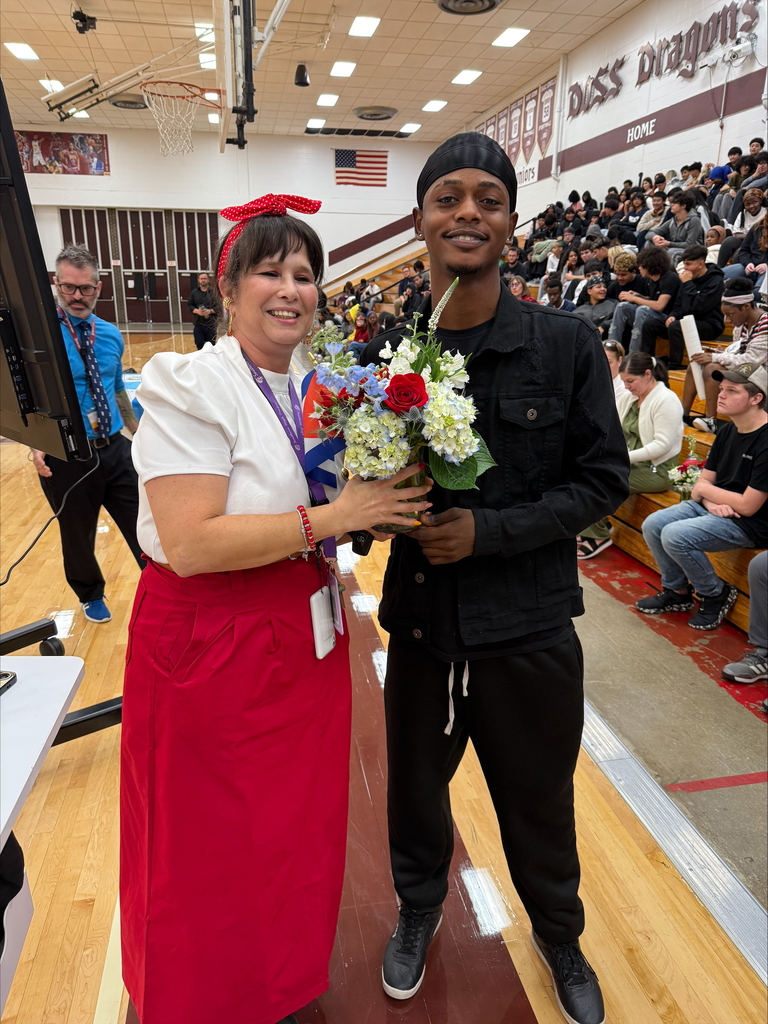 teacher and student at Hispanic Heritage Celebration