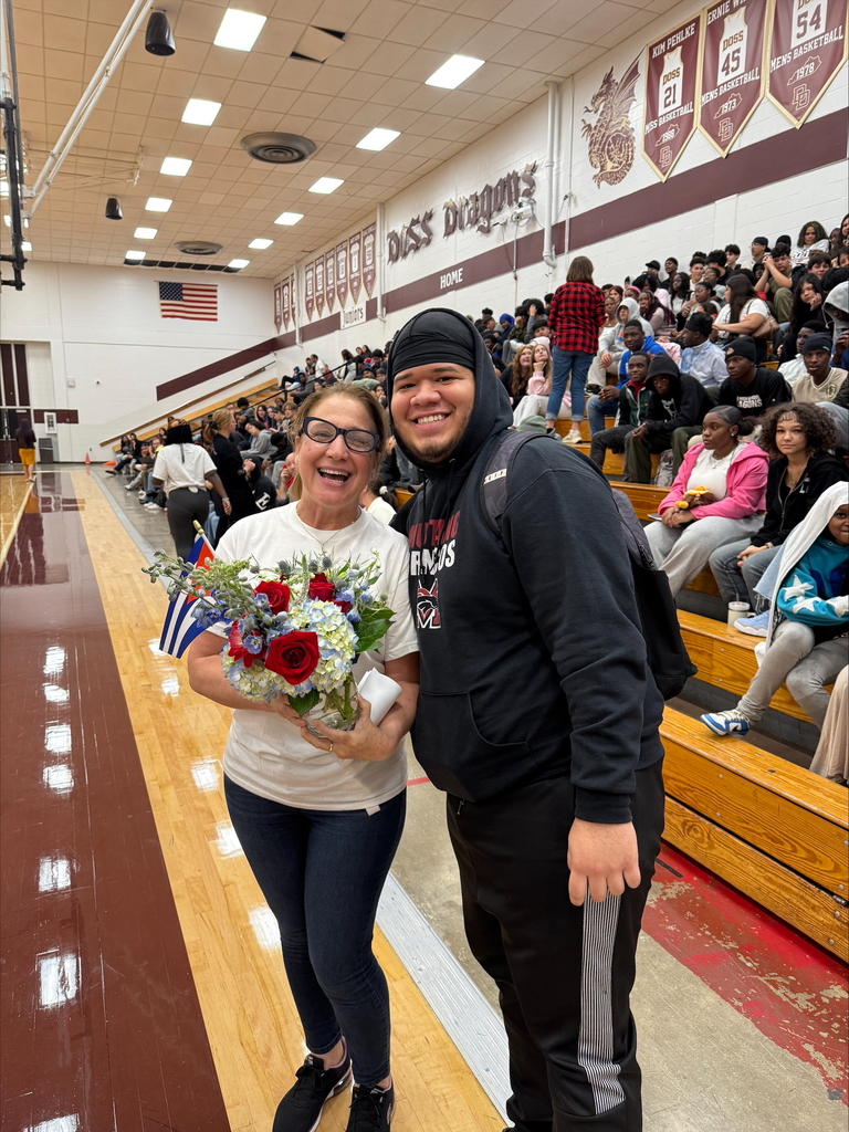 teacher and student at Hispanic Heritage Celebration