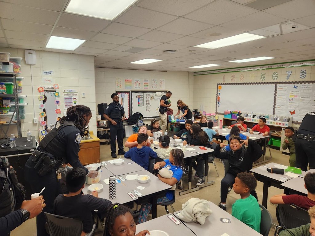 JCPS police officers host an ice cream party for Blake Elementary fourth-grade students.