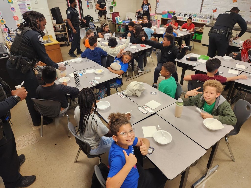 JCPS police officers host an ice cream party for Blake Elementary fourth-grade students.