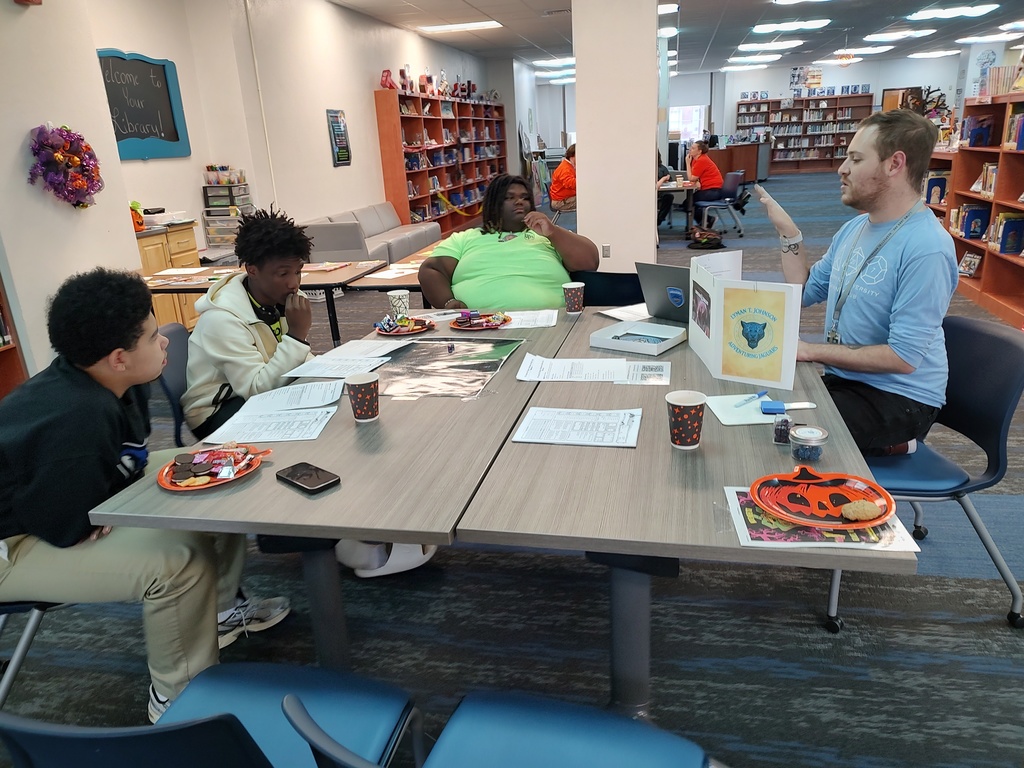 Mr. Connor as Dragon Master explaining how to play Dungeons and Dragons.