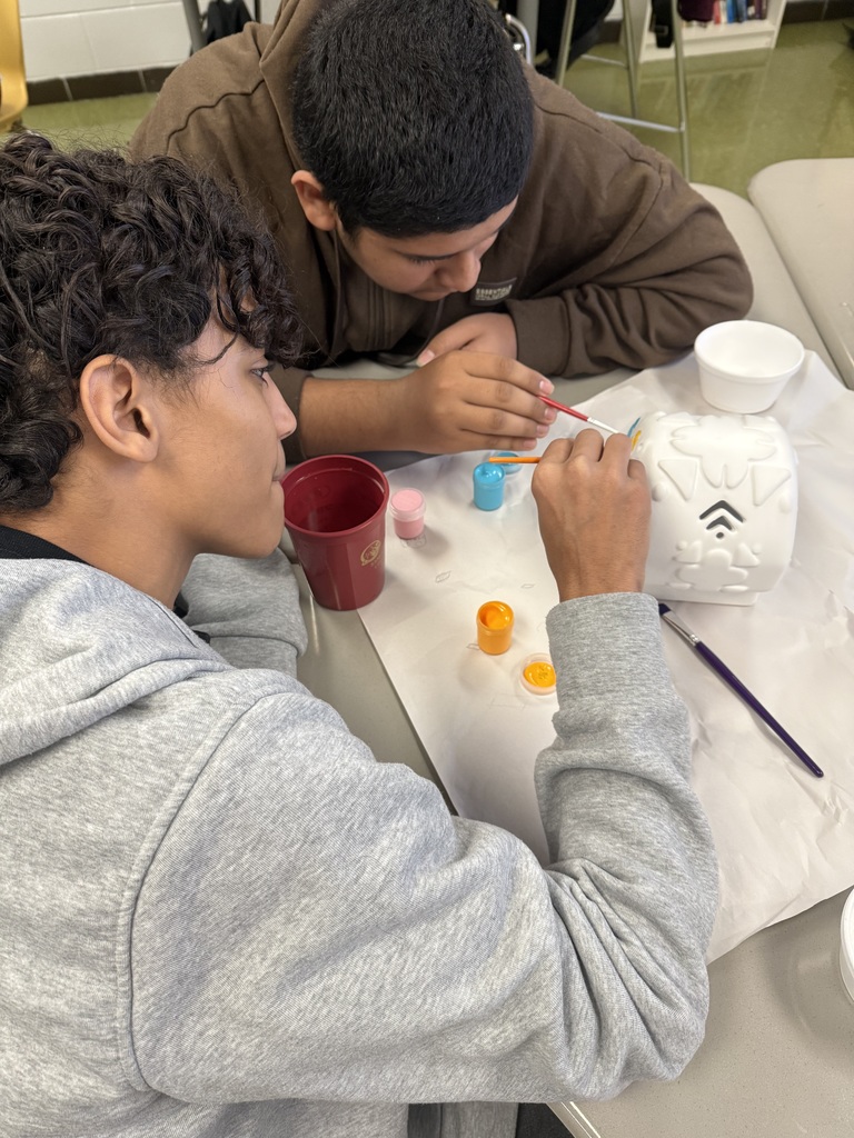 students working on their ofrenda competition